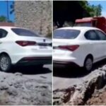 video:-maquina-escava-ao-redor-de-carro-e-deixa-veiculo-‘ilhado’-durante-obra