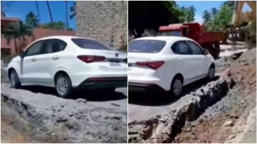video:-maquina-escava-ao-redor-de-carro-e-deixa-veiculo-‘ilhado’-durante-obra